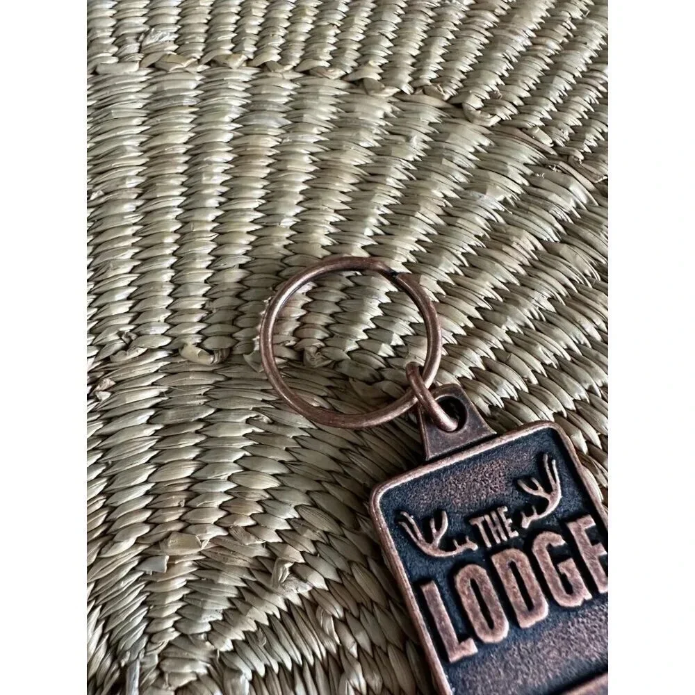 The Lodge metal bottle opener